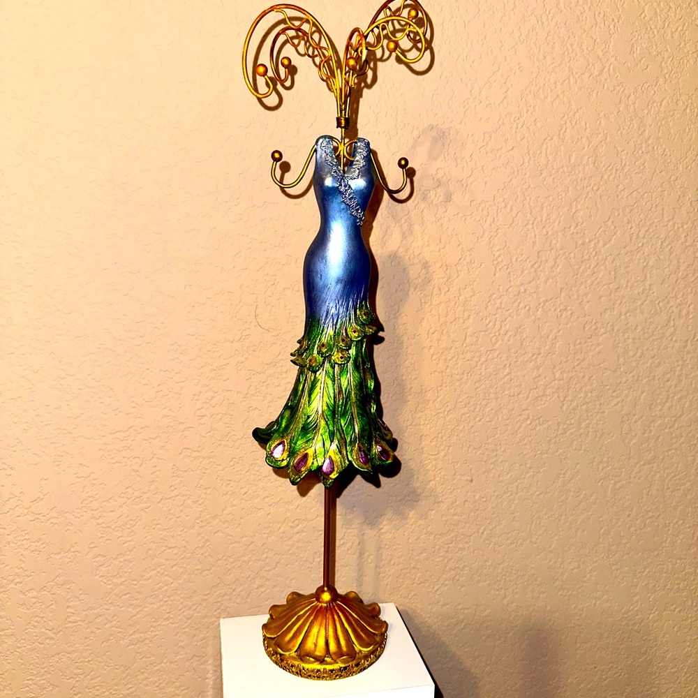 Peacock jewelry holder. Green and purple with gold tones.